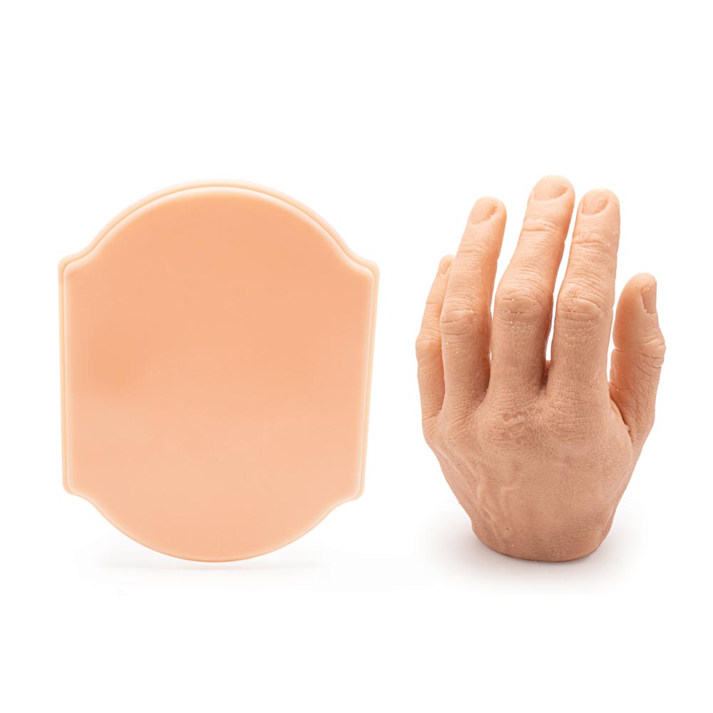 A Pound of Flesh Micro Series Tattooable Synthetic Small Plaque (with hand for scale)