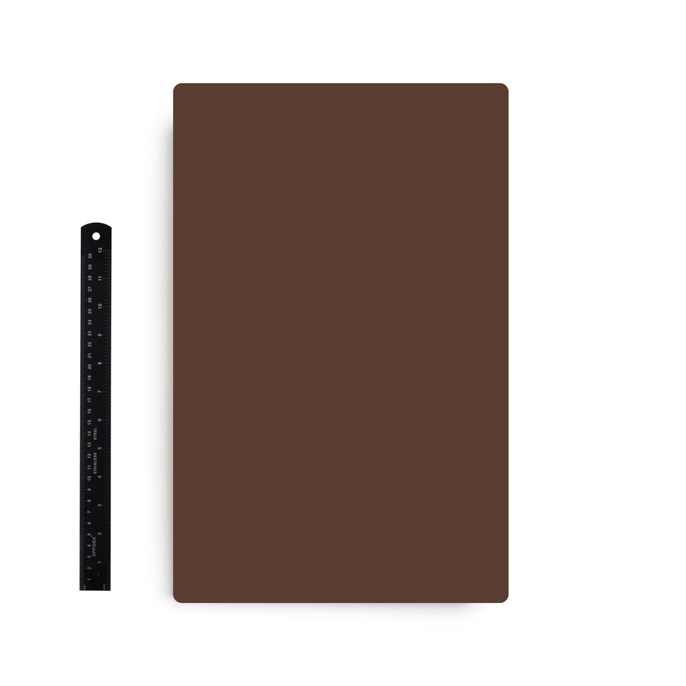 A Pound of Flesh Tattooable Synthetic Canvas in Fitzpatrick Tone 5 shown with ruler for scale