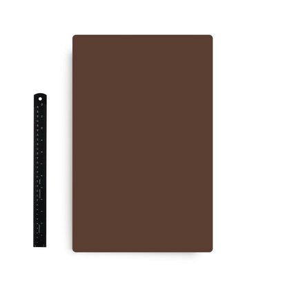 A Pound of Flesh Tattooable Synthetic Canvas in Fitzpatrick Tone 5 shown with ruler for scale