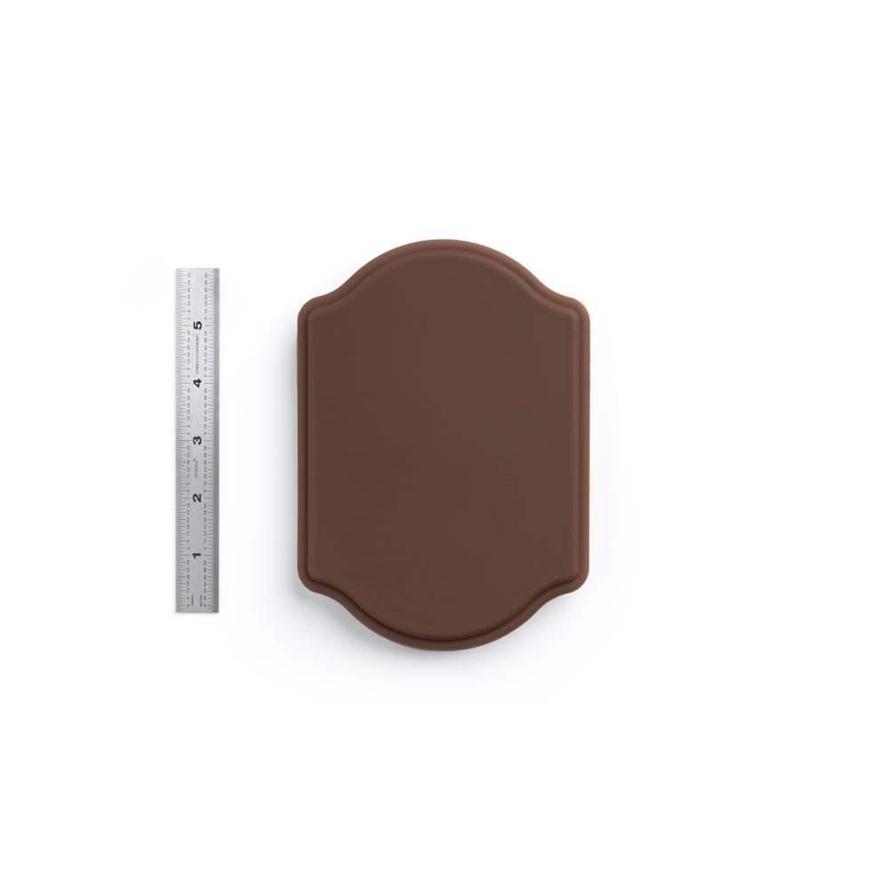 A Pound of Flesh Micro Series Tattooable Synthetic Small Plaque in Fitzpatrick Tone 5 shown with six inch ruler for scale