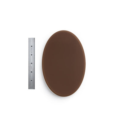 A Pound of Flesh Micro Series Tattooable Synthetic Small Oval in Fitzpatrick Tone 5 shown with six inch ruler for scale