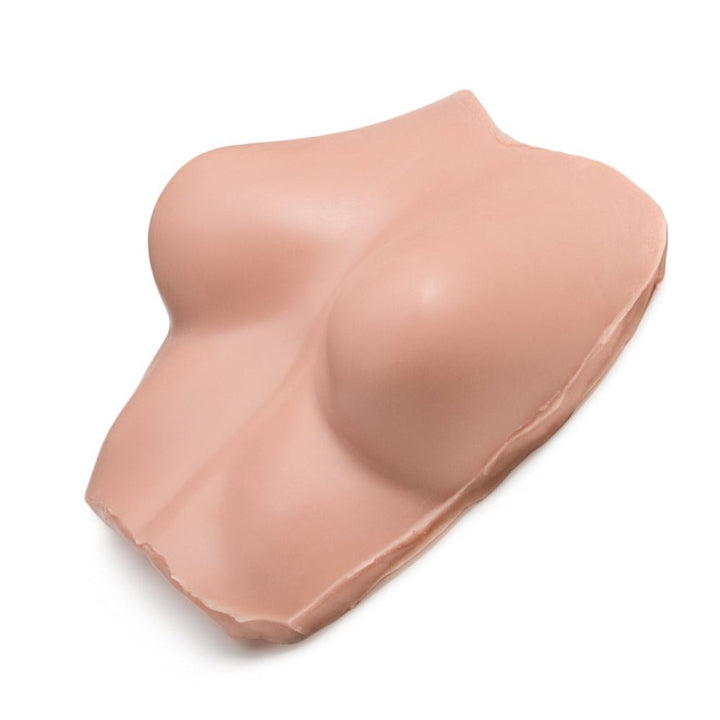 A Pound of Flesh Tattooable Synthetic Breasts with Torso — Side View